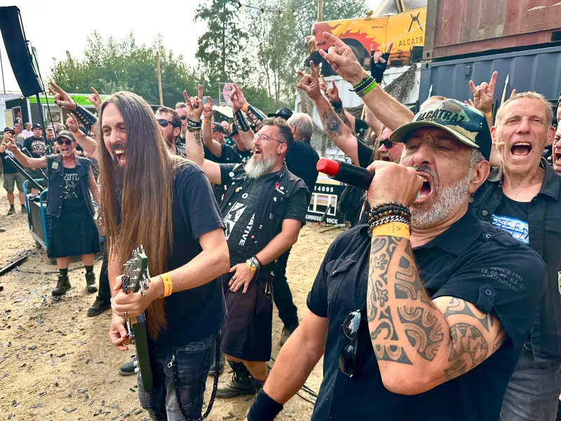 Festival crowd with horns up