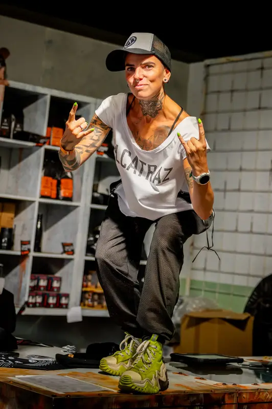 Crew member in a festival merch shop
