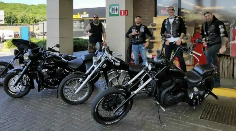 Motorcycles parked at a venue